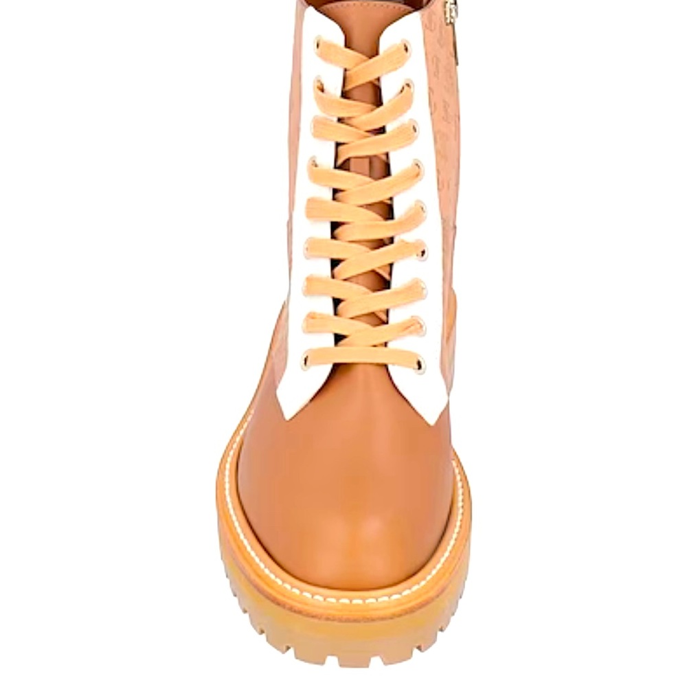 Jimmy Choo size 7 embossed combat boot comes with duster bag and box.